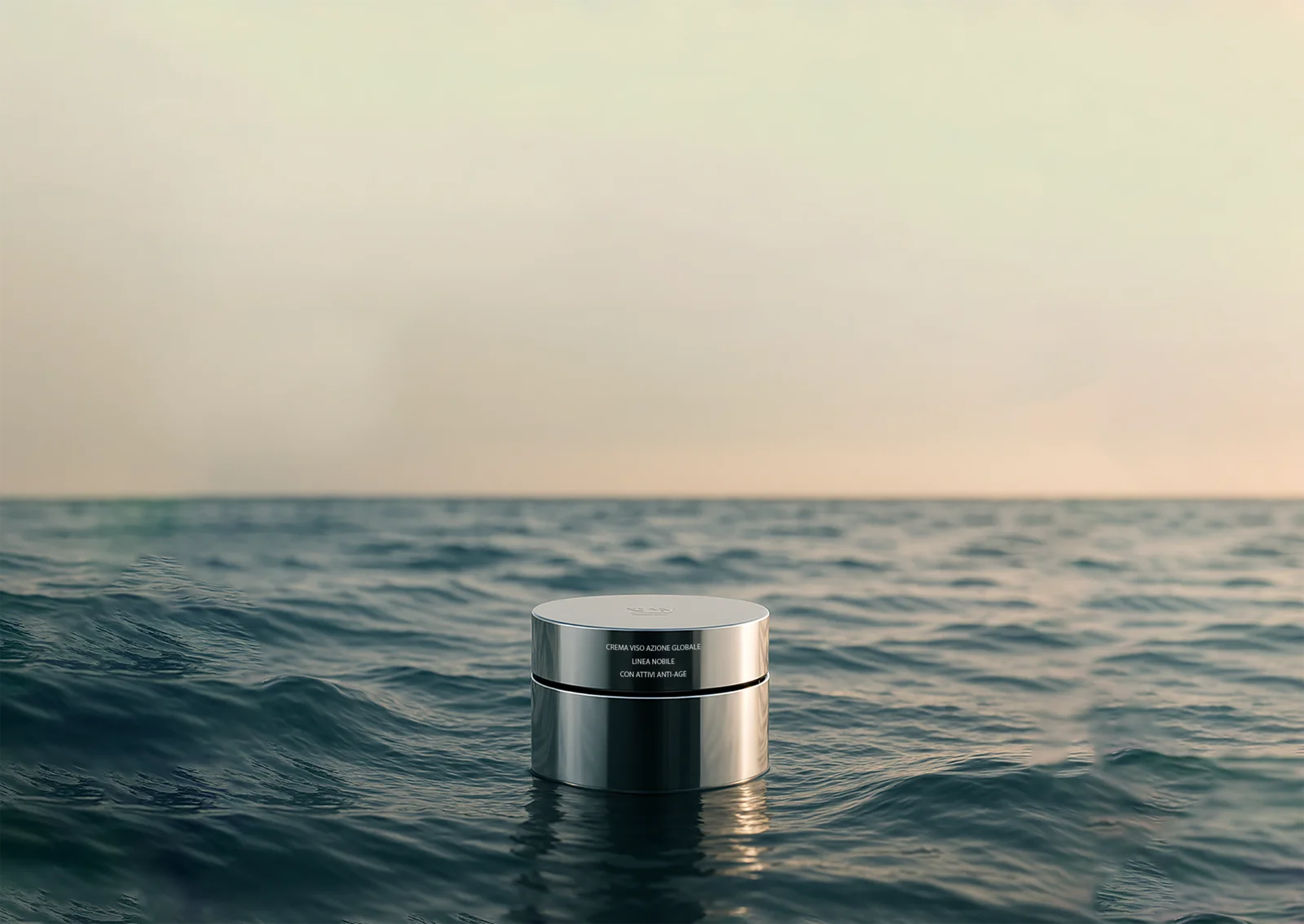 An Eligenda Roma cream jar with the sea in the background.